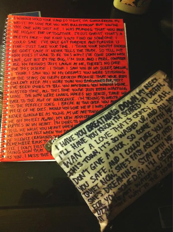 Angsty teen lyrics on notebook