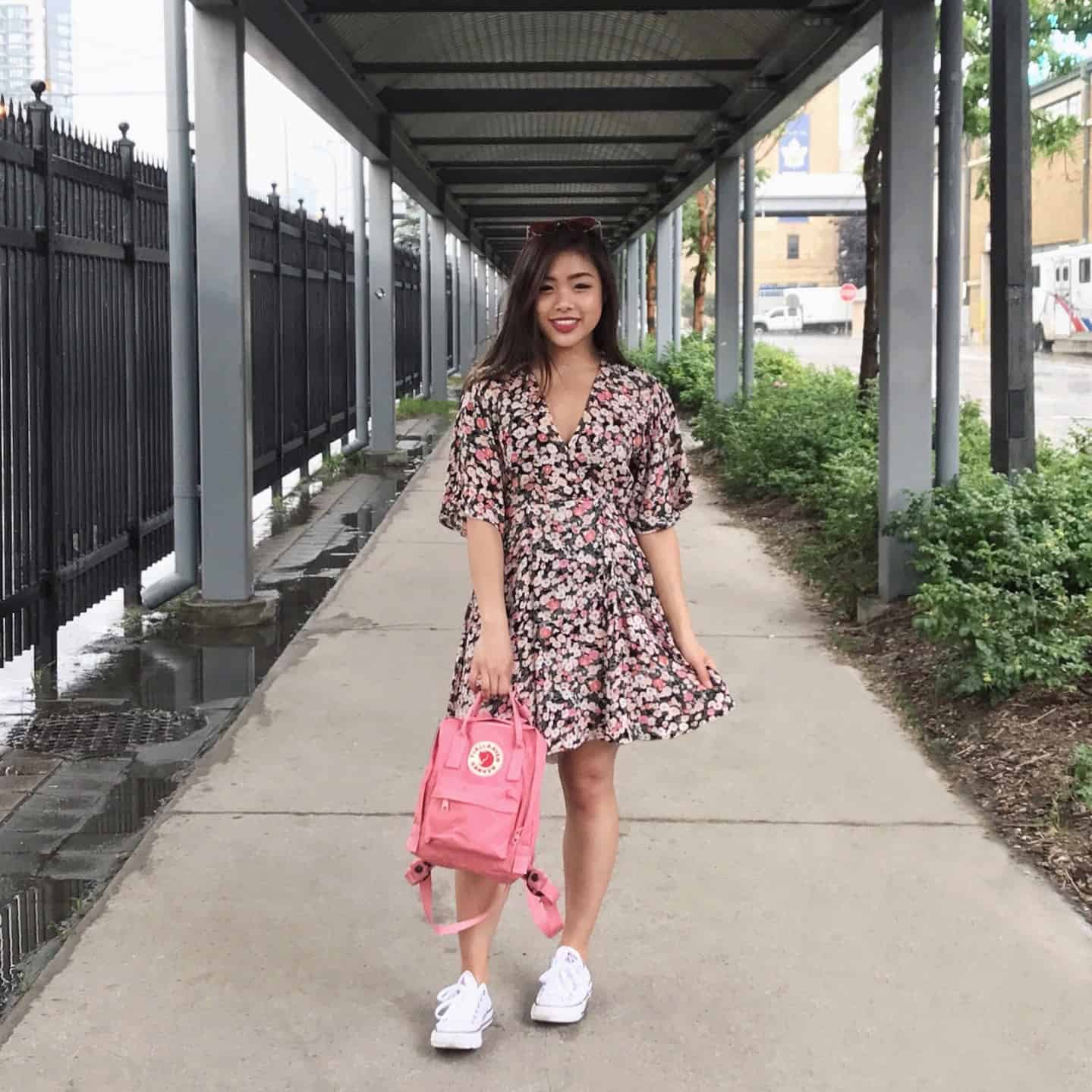 Exhibition Place Toronto - Billabong summer mini dress with Urban Outfitters red sunglasses, Fjallraven pink mini Kanken backpack, and white Converse Chuck Taylor sneakers