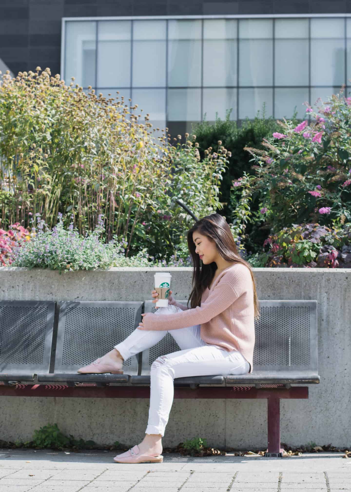 Summer to fall transitional outfit featuring Aritzia pink knit sweater and Guess white distressed jeans