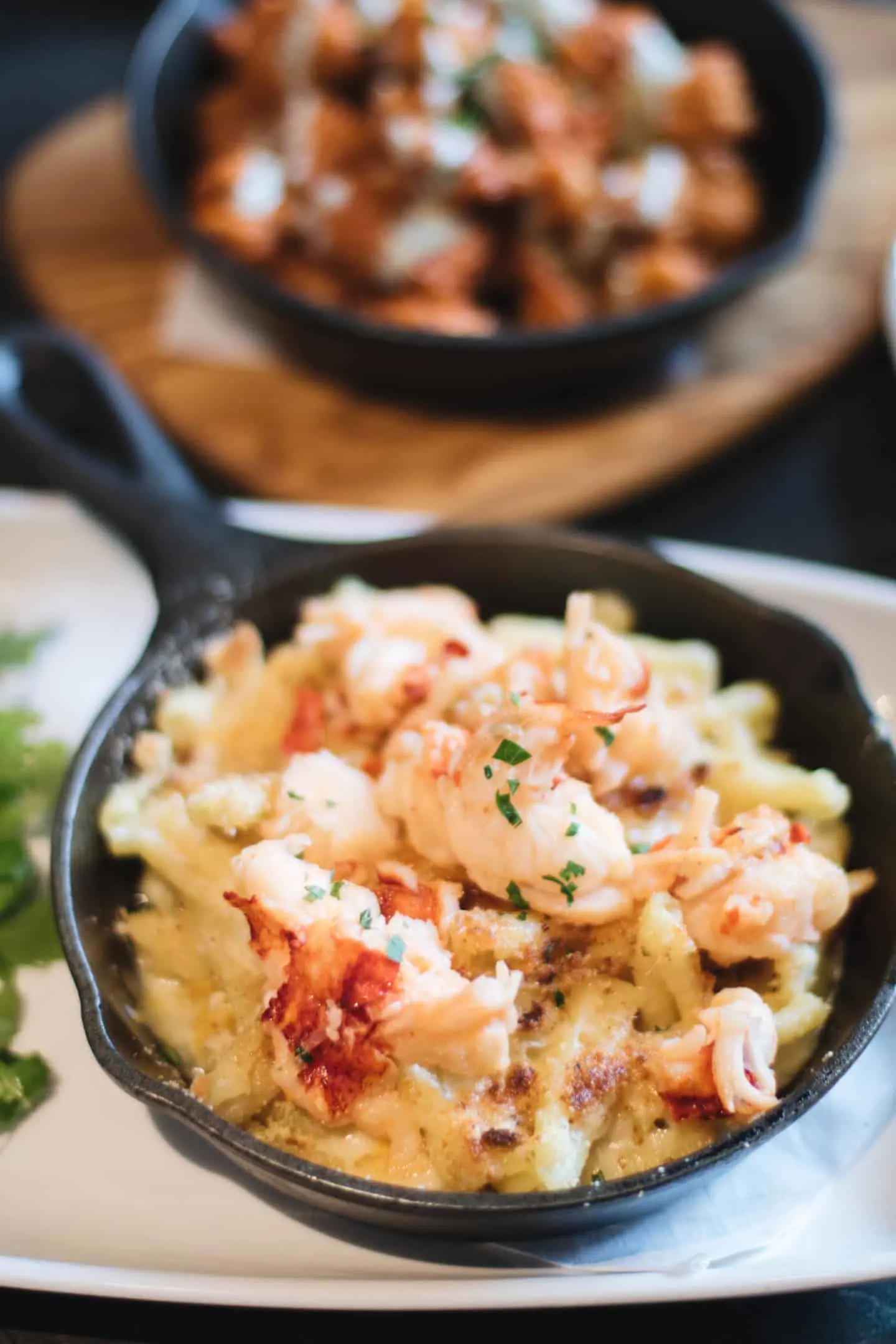 Butter-Poached Lobster on Skillet Mac + Cheese at Three10 Restaurant inside The Rec Room Toronto