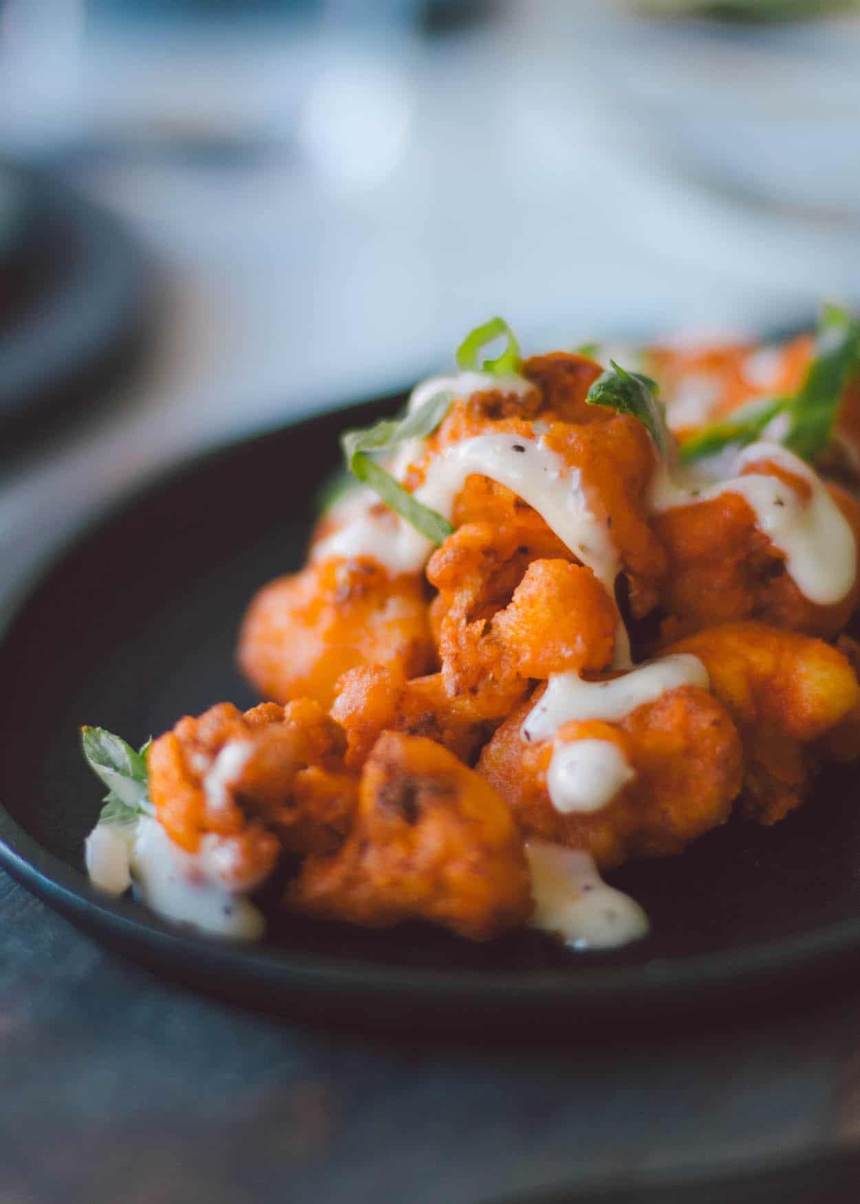 Classic Canadian cuisine and Instagram-worthy decor is what you'll find at The Commoner. Here's why you must visit this amazing restaurant located in Toronto's Roncesvalles Village!