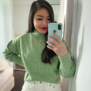 Amazon green knit sweater with Levi's white 501 denim