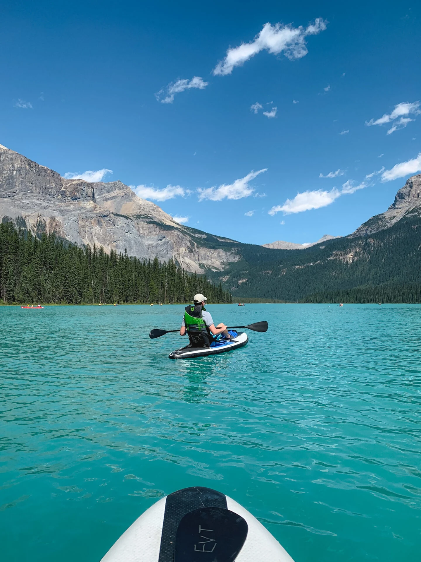 SUP boarding at Emerald Lake in Yoho National Park, British Columbia