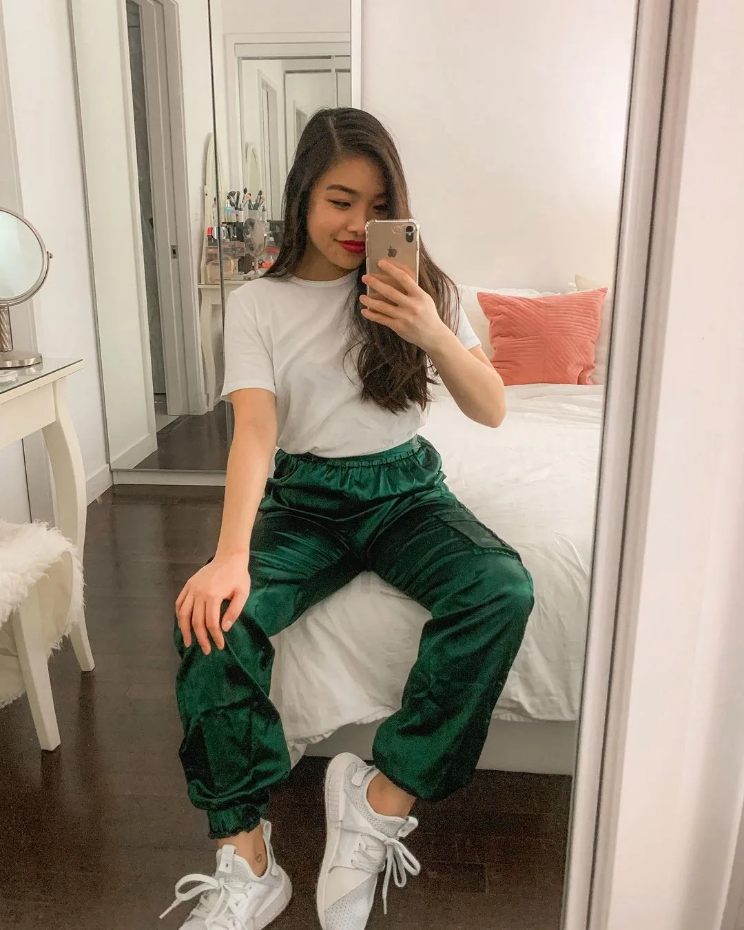 Spring outfit featuring Aritzia white t-shirt, Missguided emerald green trackpants, adidas NMD_XR1 Trail x Titolo "Celestial" Sneakers