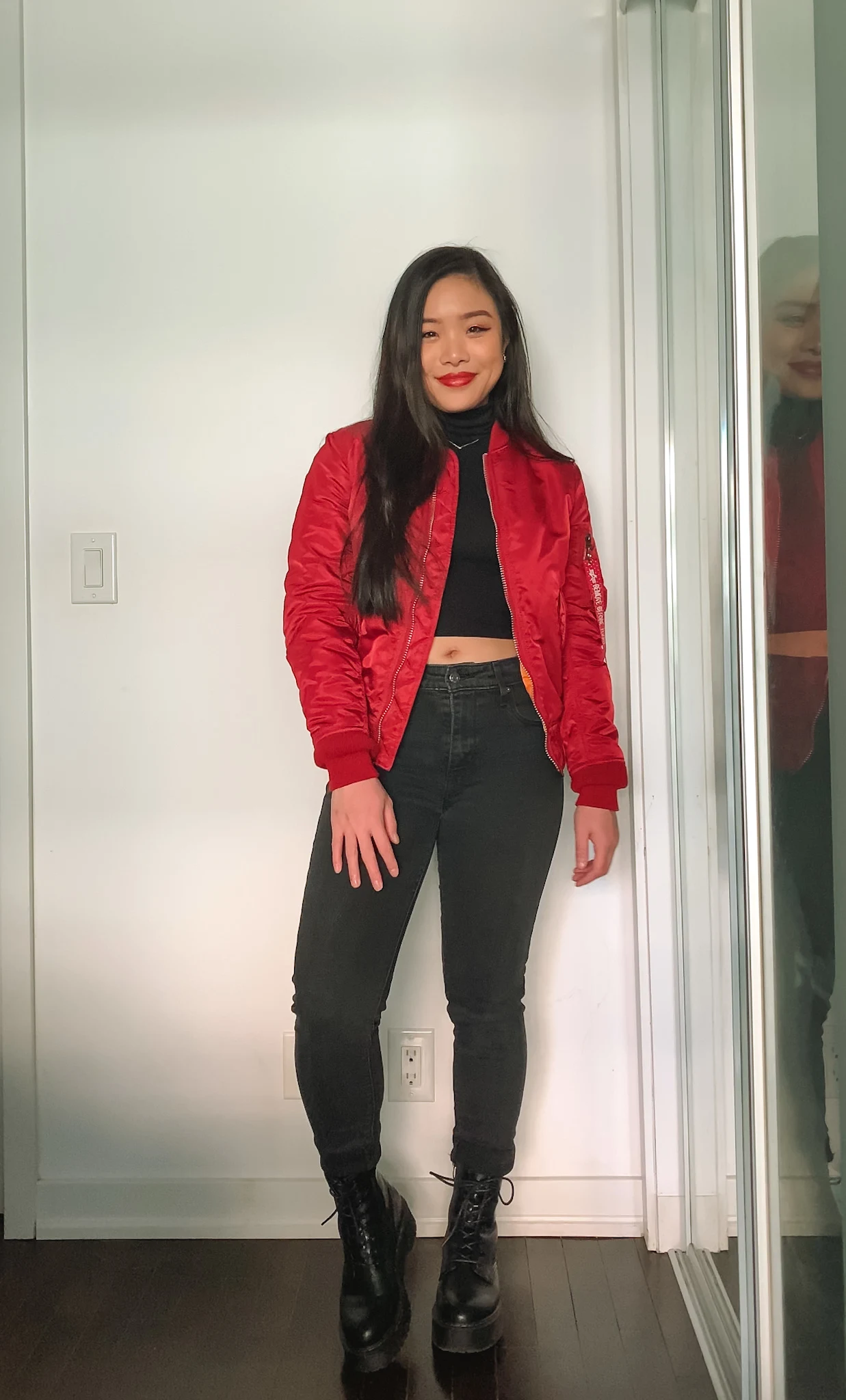 Lunar New Year & Chinese New Year outfit ideas | Alpha Industries MA-1 red bomber jacket + black cropped turtleneck + Levi's black denim + Steve Madden combat boots
