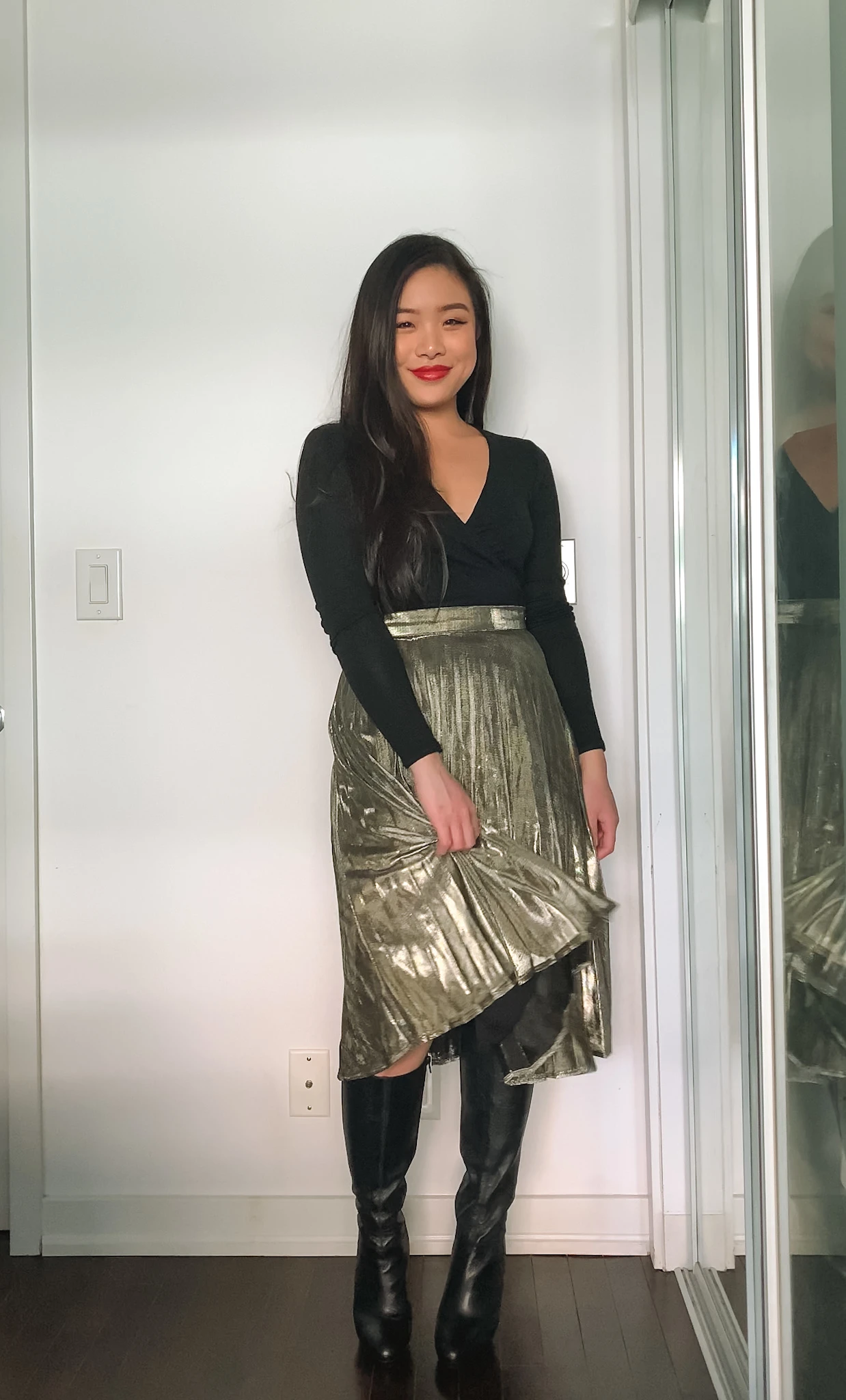 Lunar New Year & Chinese New Year outfit ideas | Aritzia black wrap top + gold pleated midi skirt + Aldo knee high boots
