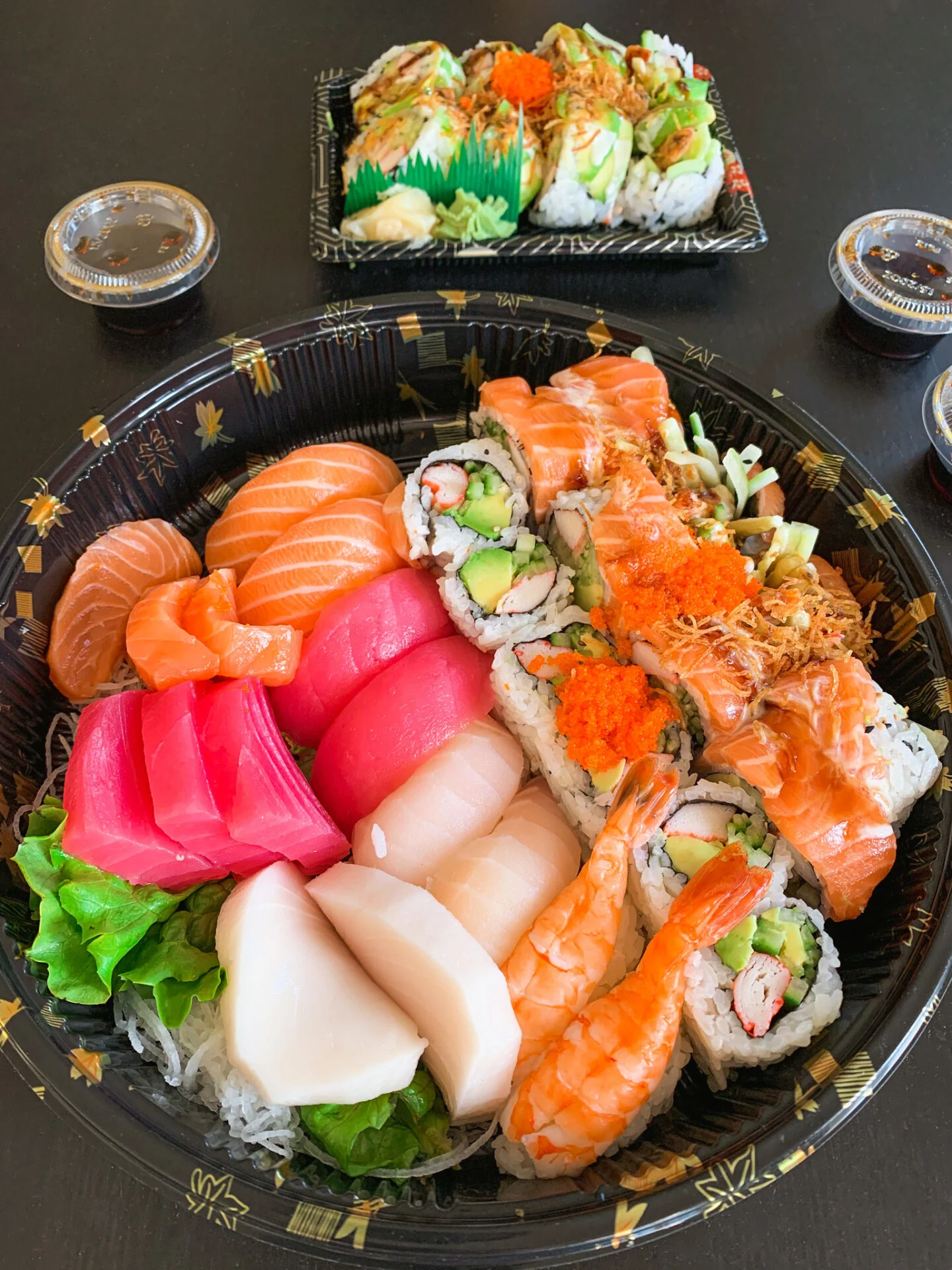 Sashimi, sushi, and maki platter from Aira Sushi in Richmond Hill, Ontario