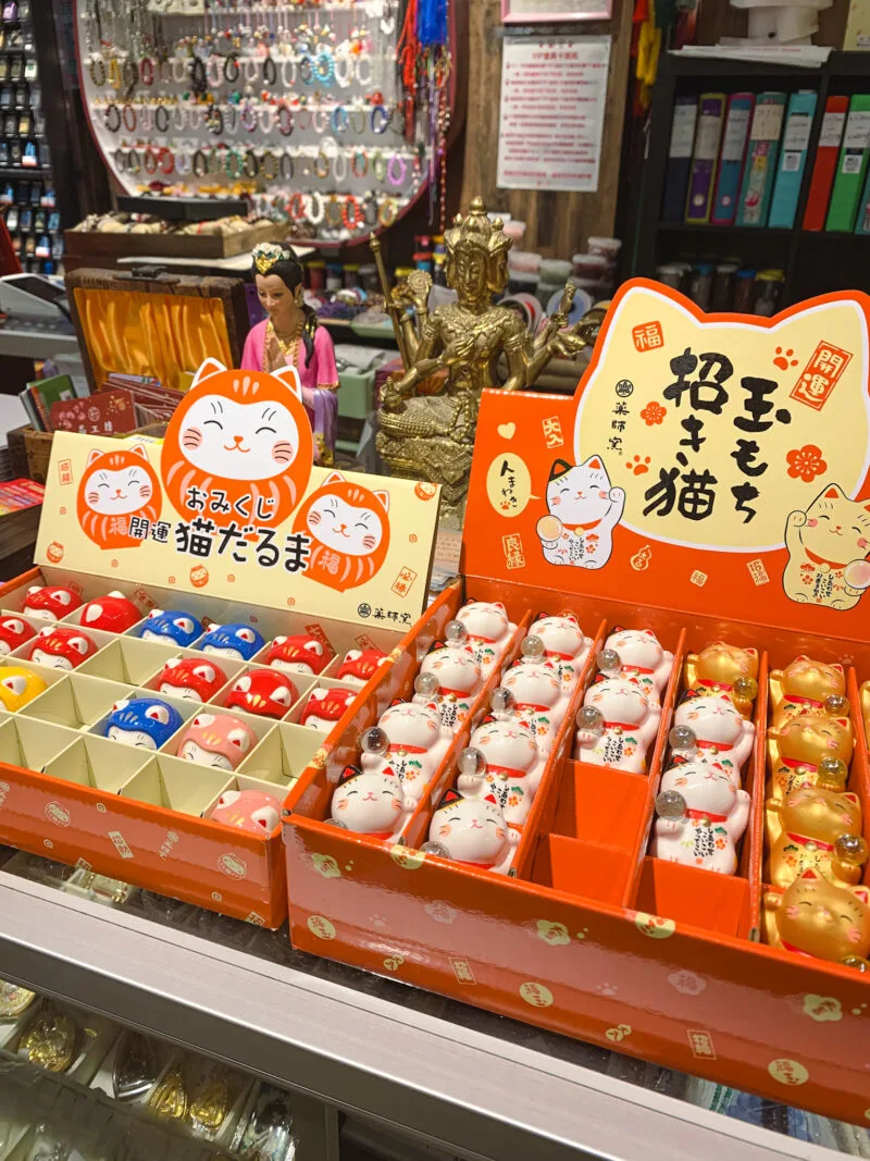 Daruma Neko and Maneki Neko figurines at Pacific Mall in Markham