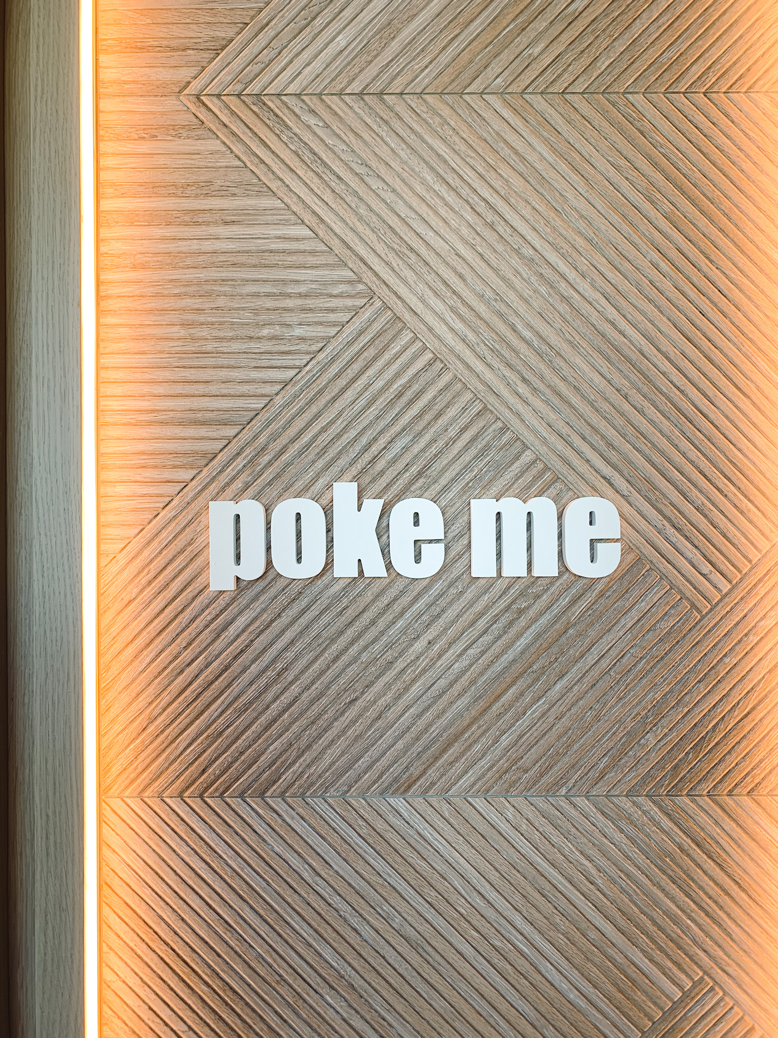 "Poke me" sign at Poke Guys in Vaughan, Ontario