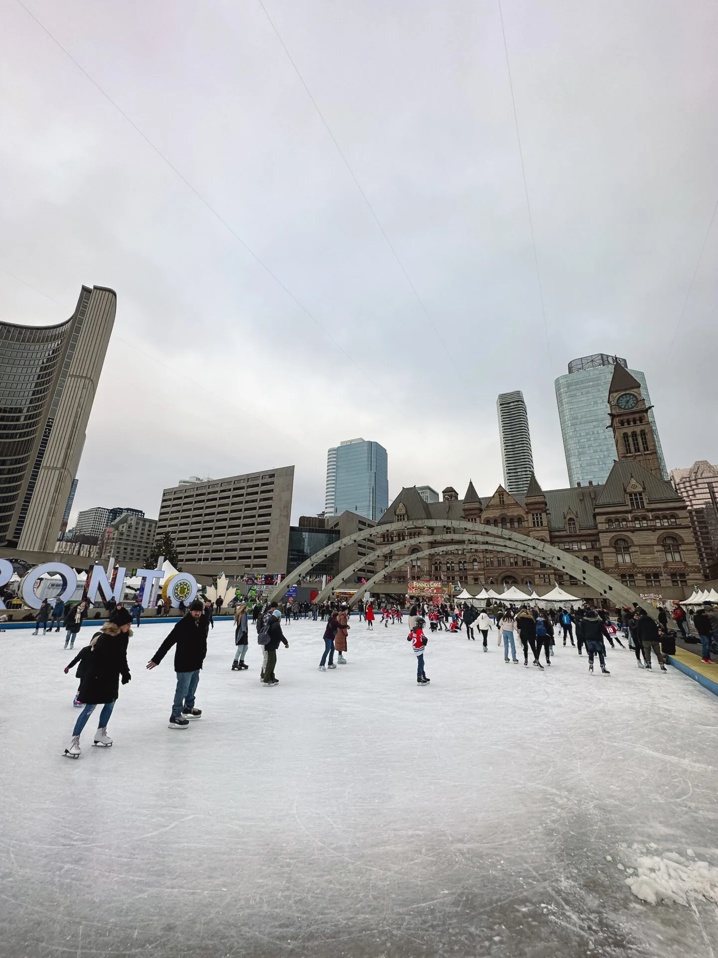 Ice skating at Nathan Phillips Square in Toronto